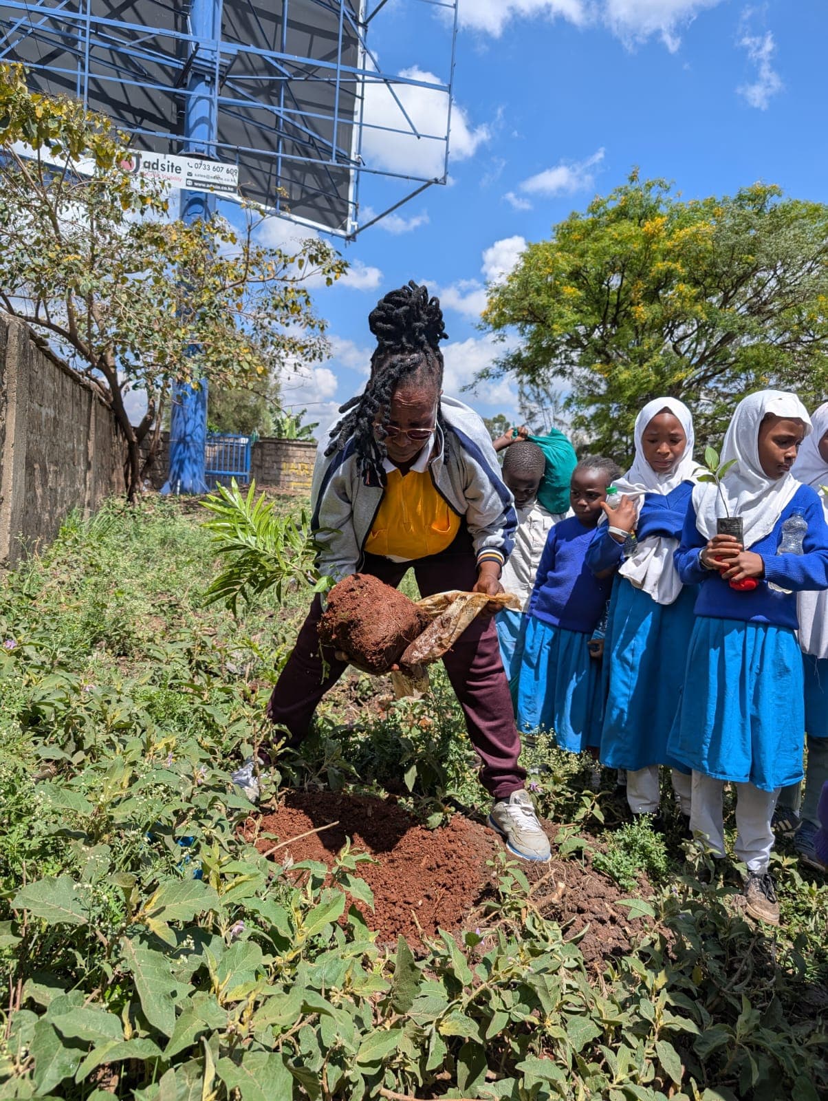 Clear photo of headteacher at environment day